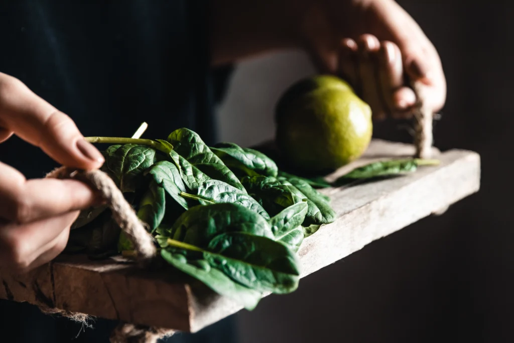 How to Grow Spinach: A Comprehensive Guide for Home Gardeners 3 Holding Spinach